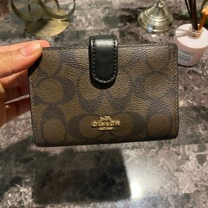 10/10 coach wallet